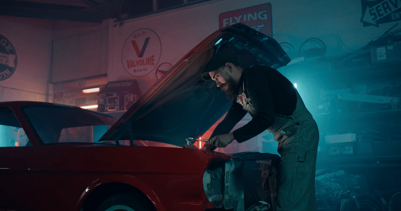 Man repairing his car easily with Light Fuse products. Because he enjoyed Spring Sale discount.